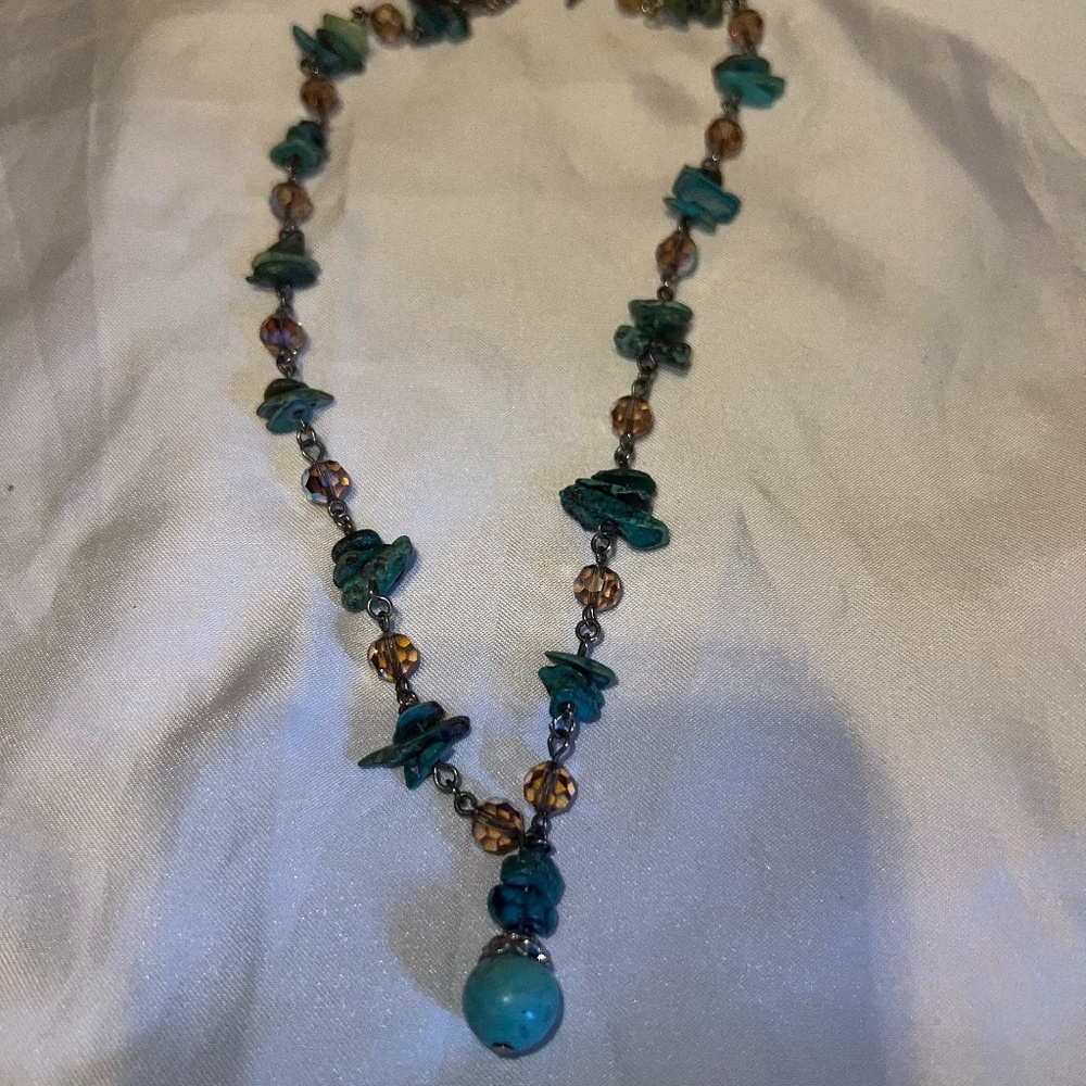 Turquoise choker necklace.